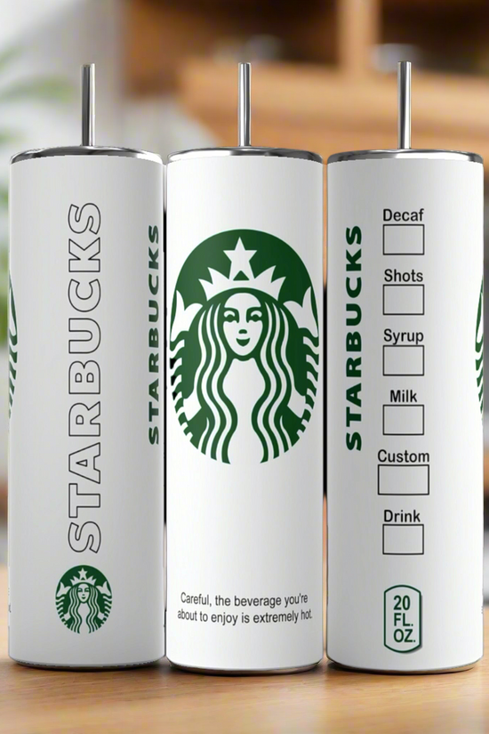 Three white Kreative Kreationz Starbucks Hot Cup 20 ounce skinny tumblers with metal straws rest on a wooden surface, featuring the Starbucks logo and customizable drink checkboxes in classic cup style.