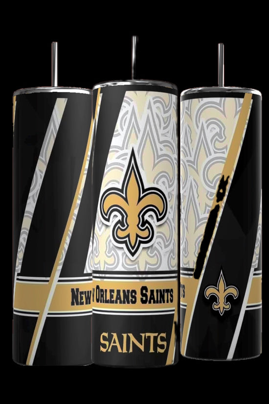 These elegant, spill-proof 20oz Skinny Tumblers from Kreative Kreationz are part of the NFL Collection. They showcase the New Orleans Saints logo and name with a striking black and gold design featuring abstract patterns and diagonal stripes.