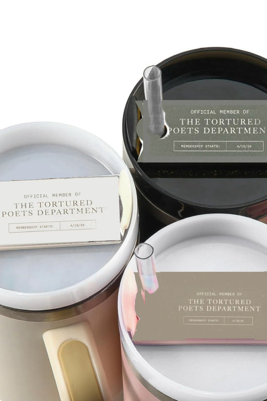 Three mugs from the Tortured Poets Department Members ONLY collection by Kreative Kreationz, each featuring a Stanley lid topper, a plastic straw, and a personalized drinkware membership card reading 