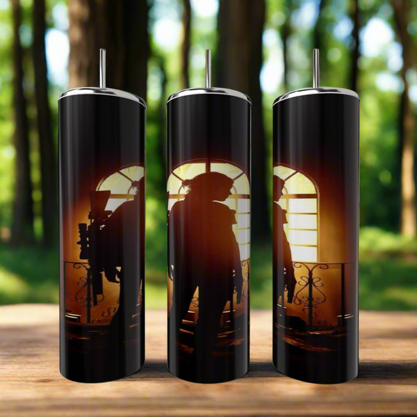 Set of three Kreative Kreationz This Is Us | Elle Game 20oz Skinny Tumblers with lids and straws, eco-friendly and reusable, feature silhouette art before backlit windows—perfect for fans. Shown outdoors on wood with a blurred forest background.