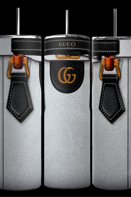 Three cylinder-shaped bottles in white are reminiscent of the GUCCI Purse Inspired 20oz Tumbler by Kreative Kreationz, featuring black leather accents and metal buckles. The bottles display a prominent black label with gold 