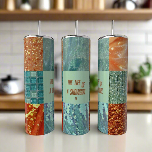 Three 20oz “The life of a Showgirl Aesthetic Taylor Swift” tumblers by Kreative Kreationz, each handcrafted with eco-friendly materials, metal straws, and adorned with colorful, glittery mosaic patterns, sit on the kitchen counter.