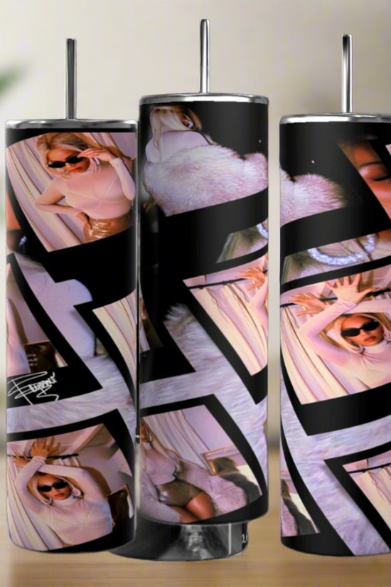 Three Beyonce 20oz Stainless Steel Tumblers by Kreative Kreationz feature a woman in sunglasses and pink on a black geometric background, with straws included, displayed together on a blurred indoor surface.