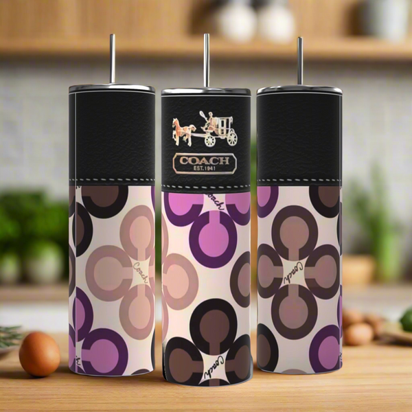Three stylish Kreative Kreationz Coach Designed 20oz tumblers, including a vibrant purple one, feature colorful circular patterns and straw tops—perfect reusable drinkware for any setting.