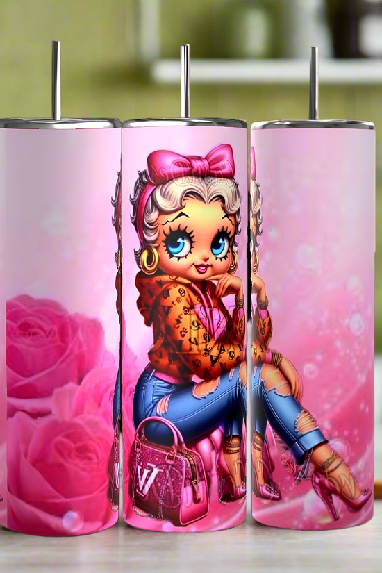 The Betty B Bougie 20oz Skinny Tumbler set by Kreative Kreationz includes three adorable pink tumblers. Each tumbler shows a cute cartoon character in a leopard print jacket with ripped jeans and pink boots, on sparkling backgrounds with pink roses and handbags.