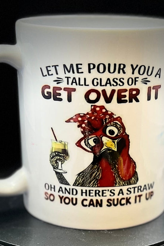 The Chicken Ceramic Mug by Kreative Kreationz features an adorable illustration of a chicken wearing a red bandana and glasses, holding a yellow drink and straw. The text humorously reads, 