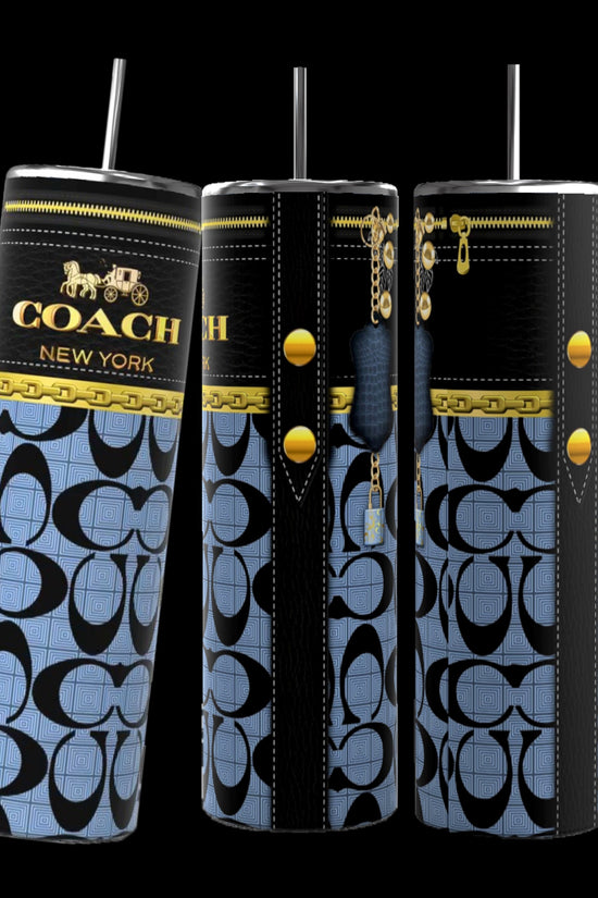 A set of three tall, cylindrical Coach Purse 20oz Tumblers from Kreative Kreationz, showcasing durable construction and a striking blue and black pattern adorned with gold chains. The Coach New York logo elegantly stands out on the black background.