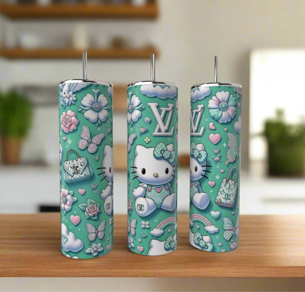 Three teal Hello Kitty LV 20oz Tumblers by Kreative Kreationz, featuring pastel flowers, butterflies, LV logos, hearts, and purses, are displayed on a wooden surface with a blurred kitchen in the background.