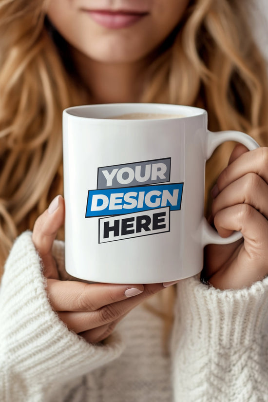 Woman holding a white mug with 