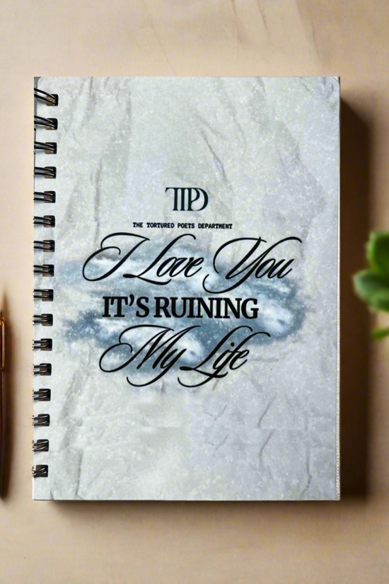 The Kreative Kreationz TTPD A6 Notebook features a marble-textured cover with 