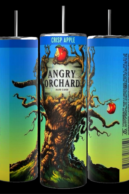 Three cans of Angry Orchard Crisp Apple Hard Cider are arranged with their labels showing. The central can features the Angry Orchard logo with an illustration of a gnarled tree with apples. The background is a blurred image of a sunny orchard, next to a Kreative Kreationz product: the Angry Orchard 20oz Tumbler boasting durable construction and 20 oz capacity.
