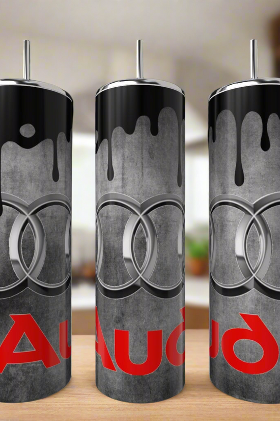 Three Kreative Kreationz Audi Enthusiast Stainless Steel 20oz Tumblers, featuring a black paint drip design with the Audi logo and red 