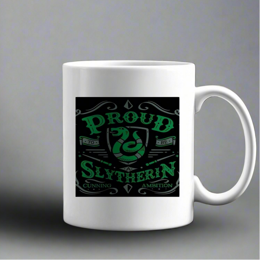 The Kreative Kreationz Proud Slytherin Ceramic Mug is a white mug with a green and black snake design and the text "Proud to be Slytherin, Cunning, Ambition.