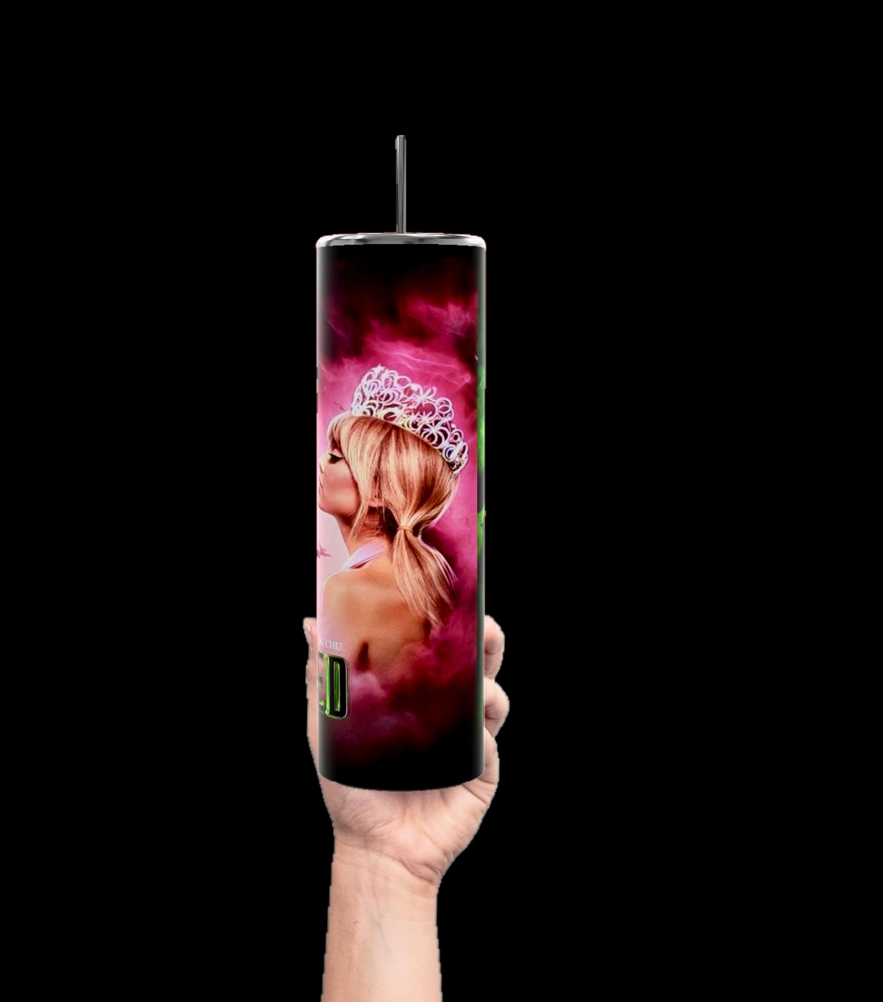 A hand holds a 20oz Wicked Tumbler by Kreative Kreationz, showcasing sublimation printing of a blonde woman with a tiara set against a pink smoky backdrop. The insulated stainless steel tumbler features a black lid and straw, ideal for keeping drinks at their desired temperature.