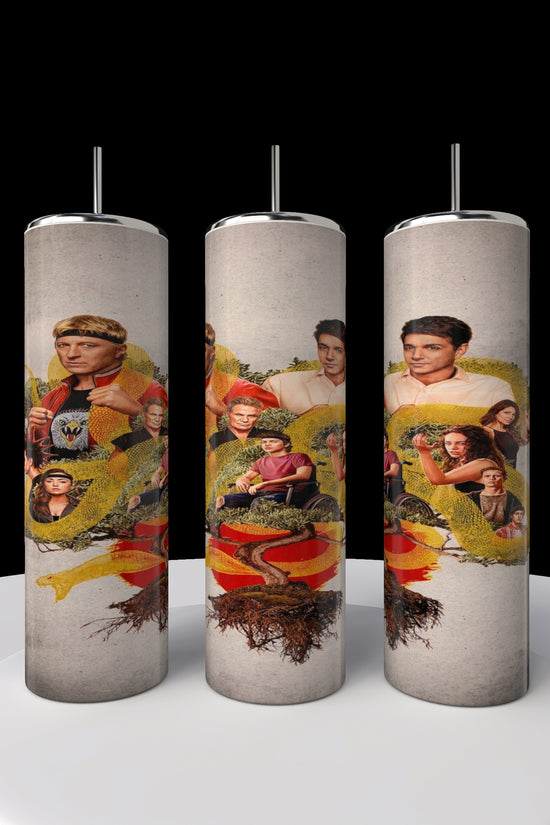 Kreative Kreationz's Kobra Kai 20oz stainless steel tumblers showcase a vibrant collage of martial arts scenes in reds, yellows, and greens against a neutral backdrop.
