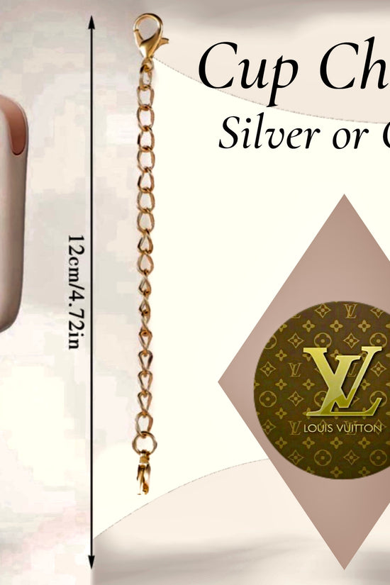 The Louis Vuitton Charm Dangle from Kreative Kreationz features a tumbler charm on a mug handle, with a 12cm/4.72in gold chain and patterned round pendant. This handcrafted accessory is available in silver or gold.