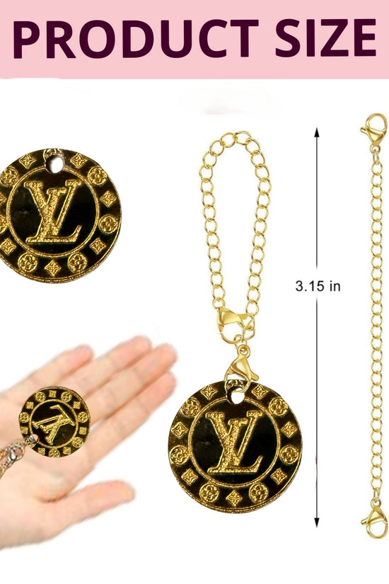 Enhance your drinkware with the Gold Laser Engraved LV Charm Dangle by Kreative Kreationz. This gold round keychain with decorative letters and a patterned border doubles as an elegant tumbler charm. It includes a chain with a clasp—pendant: 3.15”, chain: 4.6”.