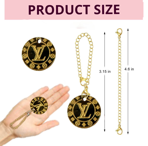 Enhance your drinkware with the Gold Laser Engraved LV Charm Dangle by Kreative Kreationz. This gold round keychain with decorative letters and a patterned border doubles as an elegant tumbler charm. It includes a chain with a clasp—pendant: 3.15”, chain: 4.6”.