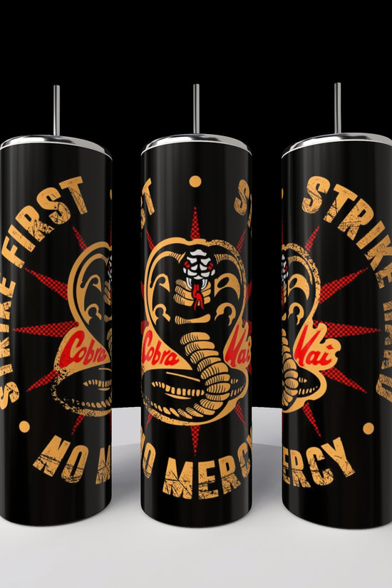 Three sleek black stainless steel Kreative Kreationz tumblers, with straws and adorned with a yellow cobra logo and the text 