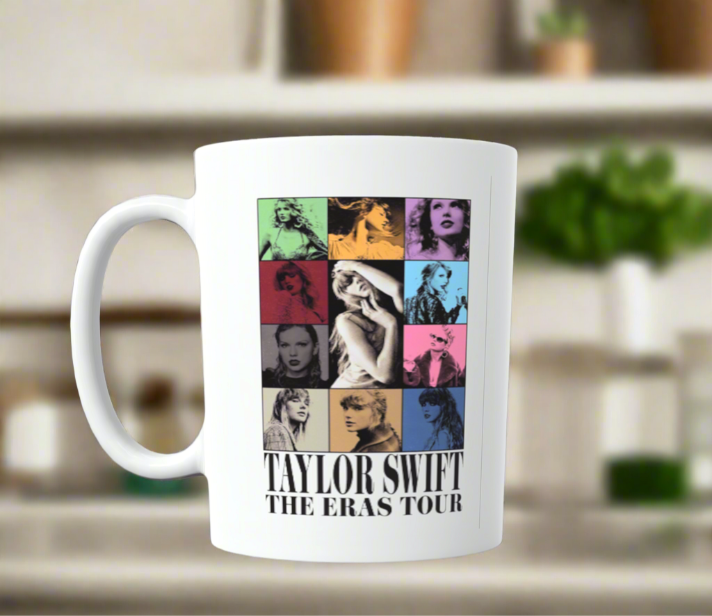 The Taylor Swift ERAS Ceramic Mug by Kreative Kreationz showcases vibrant album-style portraits with "Taylor Swift The Eras Tour" text, making it a must-have for any Swiftie.