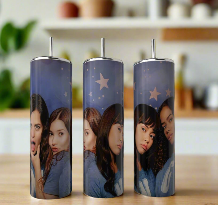 Three Ginny & Georgia Girls 20oz Tumblers by Kreative Kreationz are shown side by side, each featuring four expressive young women on a blue background with stars for a stylish, luxury-inspired look.