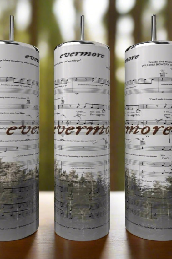The Kreative Kreationz 20oz Skinny Tumbler features a printed sheet music design and the word 