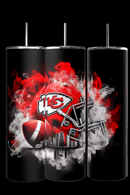 Three black insulated Kreative Kreationz Kansas City Chiefs tumblers feature red and white designs. The central stainless steel tumbler displays a red football helmet and ball with smoke-like effects around a prominent 