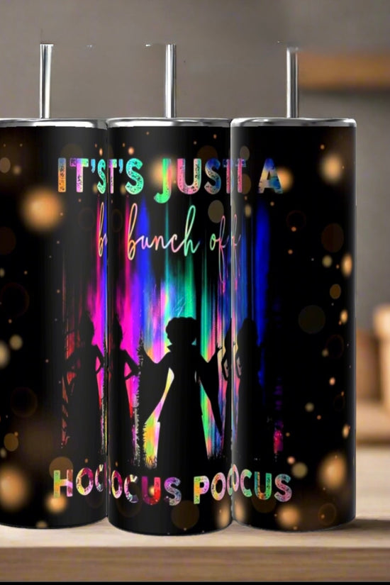The Kreative Kreationz “It’s Just a Bunch of Hocus Pocus” 20oz tumblers feature three witches’ silhouettes, colorful lights on a black background, clear lids with straws, and the fun quote: “It’s just a bunch of Hocus Pocus.”.