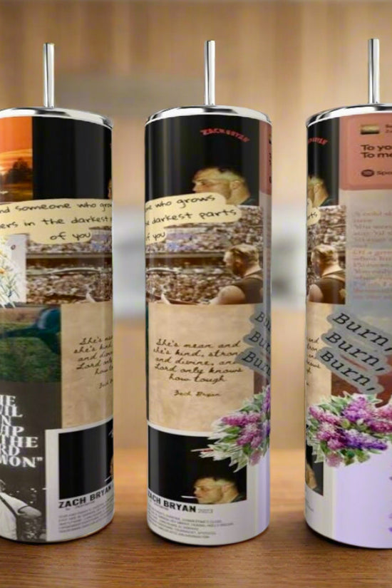 Three Zach Bryan Lyric Collage 20oz Tumblers by Kreative Kreationz, each reusable and stainless steel with a metal straw, display pastel text, flowers, and photos on a wooden surface against a blurred kitchen background.