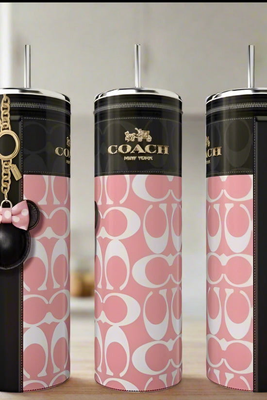 Three 20oz Coach Pink Minnie Skinny Tumblers by Kreative Kreationz, each with straw, feature pink and white Coach patterns with black accents. Includes a Minnie Mouse keychain and a pink Coach tag—eco-friendly luxury for your kitchen.