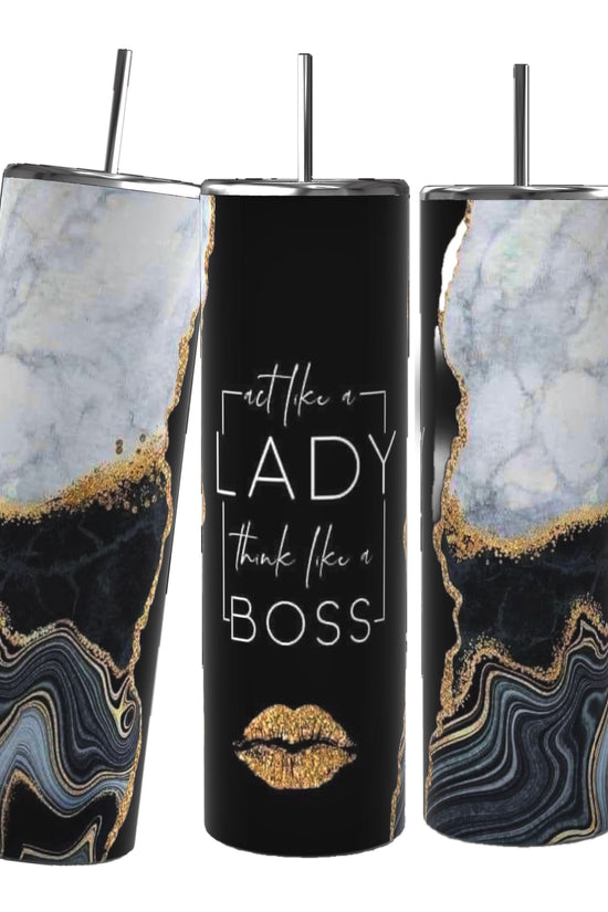 Three tall tumblers with reusable straws and spill-proof lids from Kreative Kreationz. The tumblers on the left and right showcase a stunning marble and gold swirl design, while the center one, known as the 