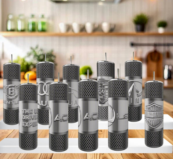Ten Kreative Kreationz Car Enthusiast Silver Stainless Steel 20oz Tumblers, each featuring various car brand logos, are displayed on white shelves in a modern kitchen, blending with jars and plants in the blurred background.
