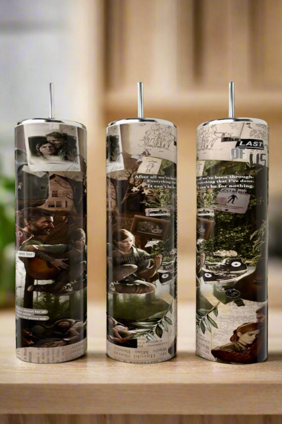 Three 20oz Skinny Tumblers by Kreative Kreationz, featuring The Last Of Us game collage artwork in muted earth tones, sit on a wooden surface with a blurred kitchen background. Each eco-friendly tumbler includes a metal straw.