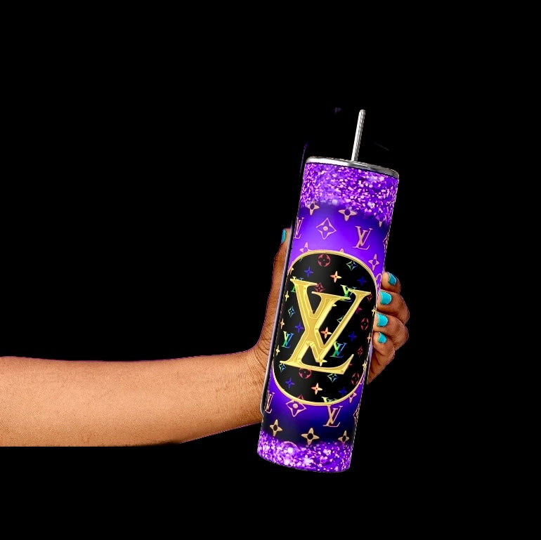 A hand with turquoise nails holds the Chanel 20oz Skinny Tumbler by Kreative Kreationz, featuring a royal blue design, luxury-inspired accents, and a sleek finish.