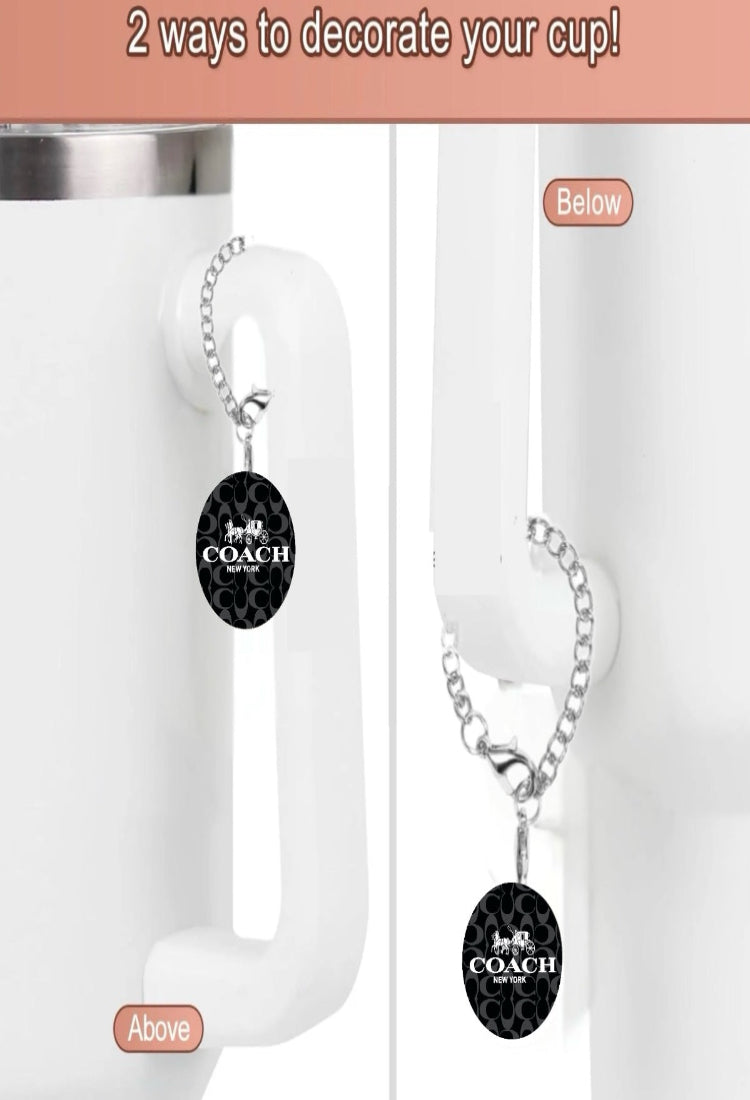 Two images of a white mug handle display the Coach Charm Charm by Kreative Kreationz. The left image shows it hanging from the top ("Above"), and the right from the bottom ("Below"). Text reads, "2 unique designs to decorate your cup!.