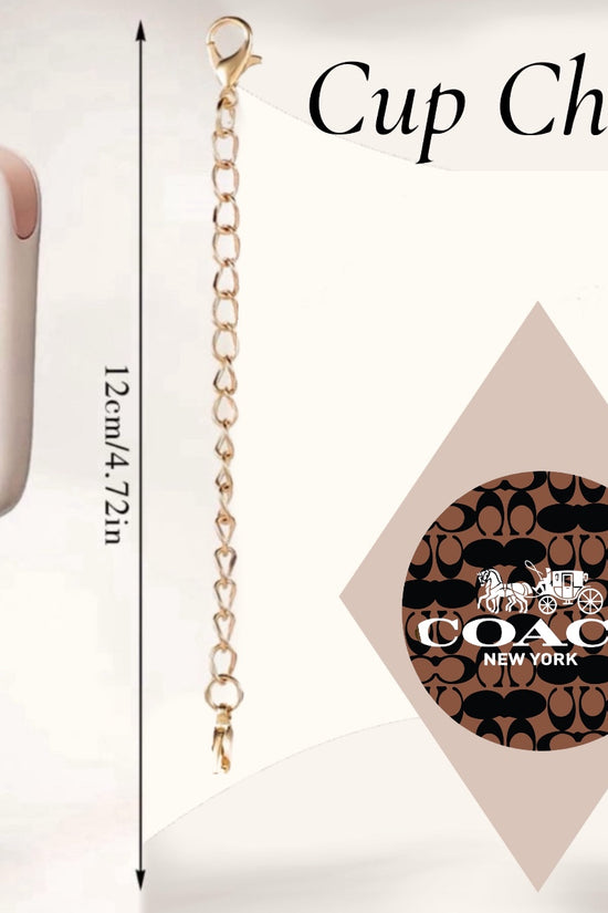 A white mug with a light pink handle from Kreative Kreationz features the Coach Cup Charm. The charm, boasting a brown and black pattern alongside the Coach New York logo, elegantly dangles as a tumbler accessory. A close-up of this handcrafted charm is shown on the right.