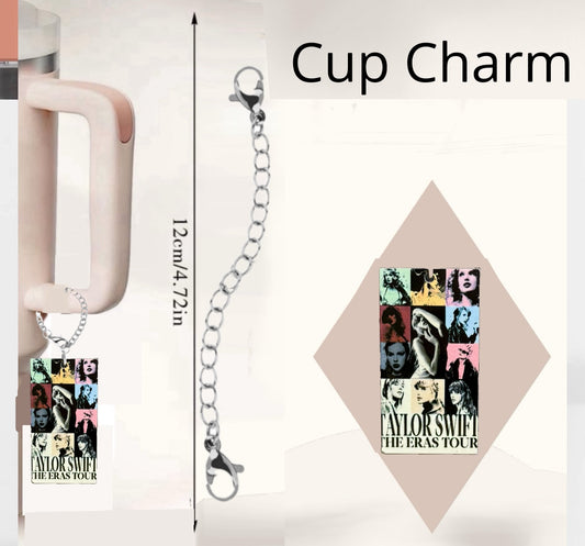 The ERAS Charm Dangle by Kreative Kreationz is a stylish cup accessory featuring a silver chain and a tag with colorful Taylor Swift "The Eras Tour" images, perfect for fans to attach to their tumbler handles.