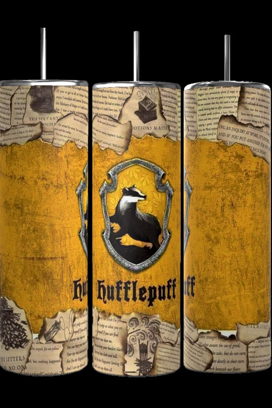 Displayed against a yellow background, three cylindrical objects resemble a collage of torn pages. The central item is a Kreative Kreationz Harry Potter Collection 20oz Tumbler, showcasing a crest with a badger and the word 