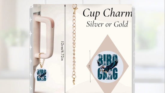 Kreative Kreationz’s Bird Gang | Eagles | Football Charm Dangle features a gold cup charm with an Eagles 