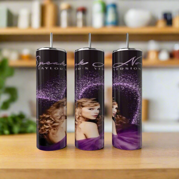 Three Speak Now 20oz Tumblers by Kreative Kreationz, featuring Taylor Swift images and "Speak Now Taylor’s Version" text in a luxury-inspired design, are displayed on wood with a blurred kitchen background. Eco-friendly and reusable.