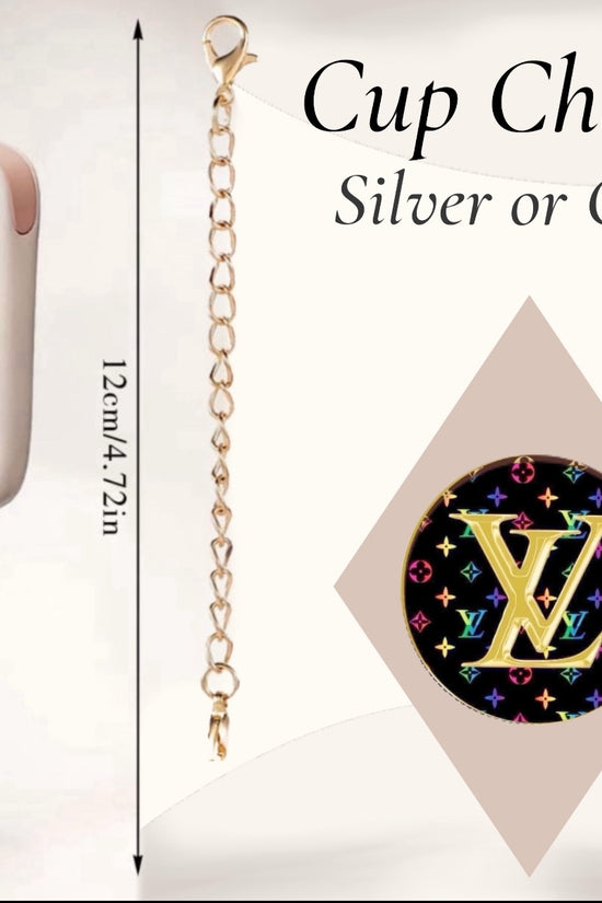 The Louis Vuitton Charm Dangle by Kreative Kreationz is a gold or silver 12 cm cup chain with a lobster clasp and round black personalized pendant, featuring a colorful pattern and gold 