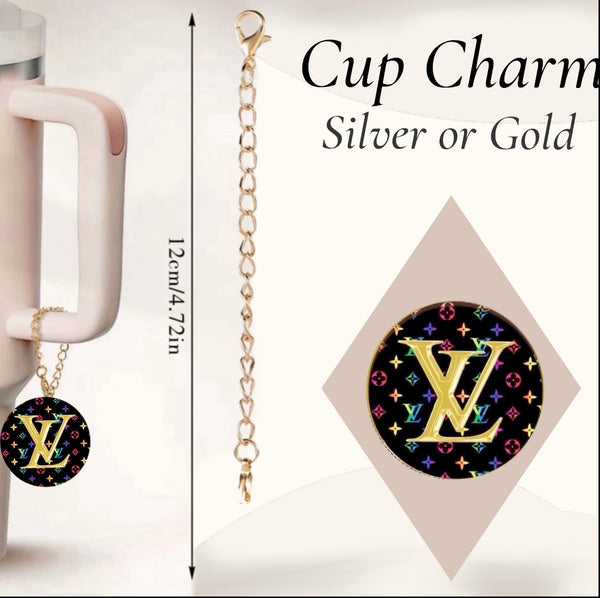 The Louis Vuitton Charm Dangle by Kreative Kreationz is a gold or silver 12 cm cup chain with a lobster clasp and round black personalized pendant, featuring a colorful pattern and gold "LV" initials—perfect as a stylish cup accessory.