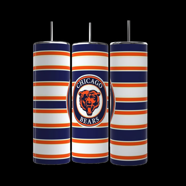 The Chicago Bears 20oz Tumblers by Kreative Kreationz have vertical blue, orange, and white stripes. The center tumbler displays a circular logo with a bear and "Chicago Bears" on a blue background. Each features double-wall insulation for temperature control and includes a metal straw.