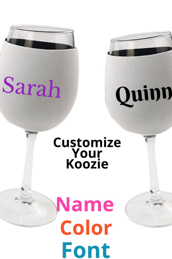 Two wine glasses with gray Custom Wine Koozies from Kreative Kreationz stand proudly. One koozie showcases 