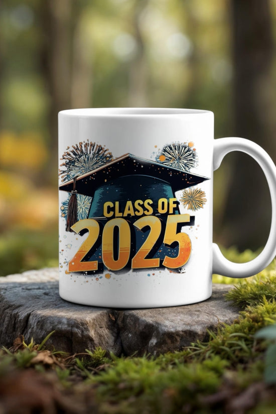 The Kreative Kreationz Class of 2025 Graduate Mug, adorned with a graduation cap, fireworks, and 