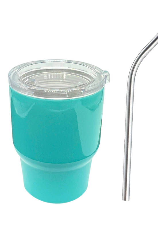 The Kreative Kreationz Shot Glass Tumbler in turquoise features a clear lid and sits beside a metallic reusable straw on a white background, highlighted by its sleek stainless steel accents for modern flair.