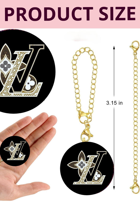 The LV Charm Dangle by Kreative Kreationz is a round keychain cup accessory with a gold chain, clasp, and decorative 