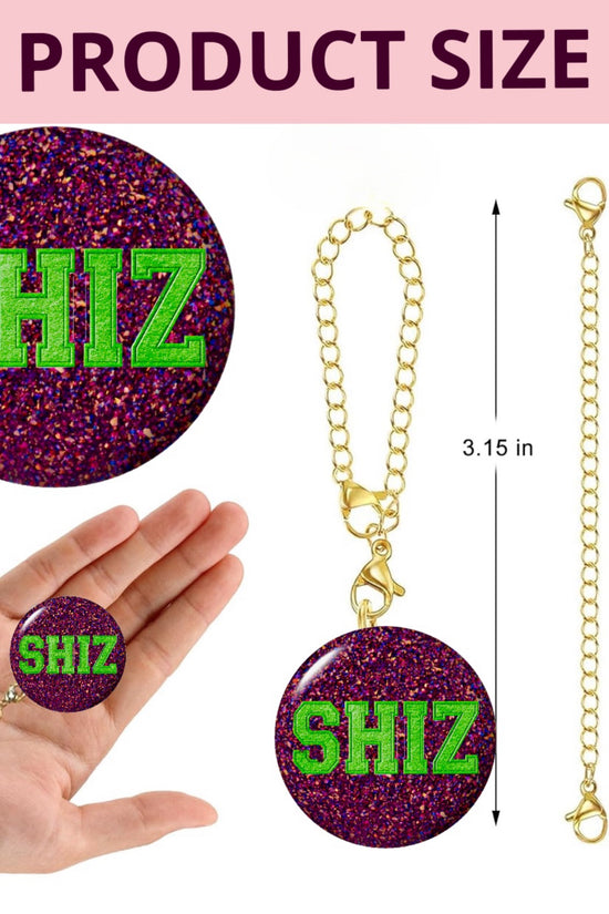 Hand showing SHITZ wicked cup charm