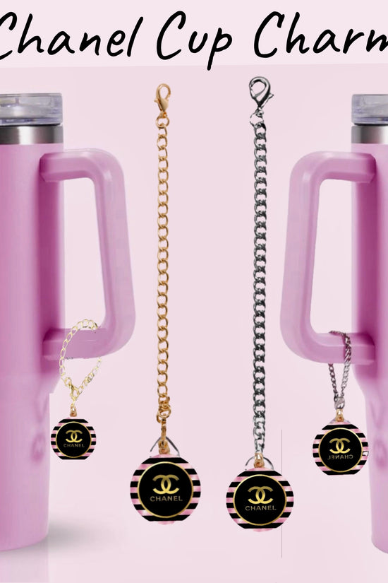 A pink tumbler with a straw and handle sits next to Kreative Kreationz's Chanel Charm Dangle, a custom cup accessory. Each charm features a circular 