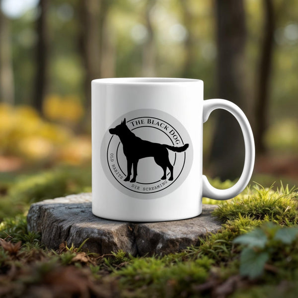 The Black Dog | TTPD -Taylor Swift Mug by Kreative Kreationz features a black dog silhouette and “The Black Dog” text—ideal for unique mug lovers or Taylor Swift fans.